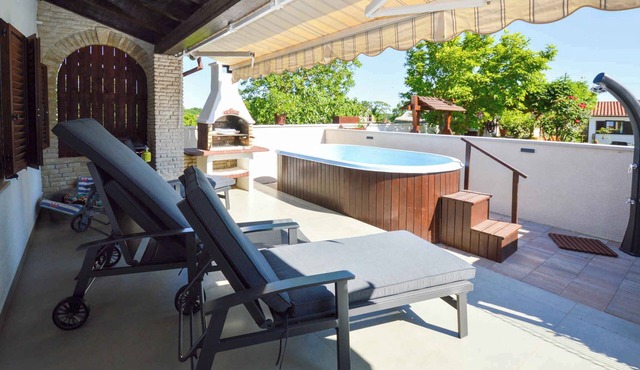 Holiday home with pool and barbecue