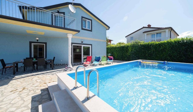 Holiday home with pool and barbecue