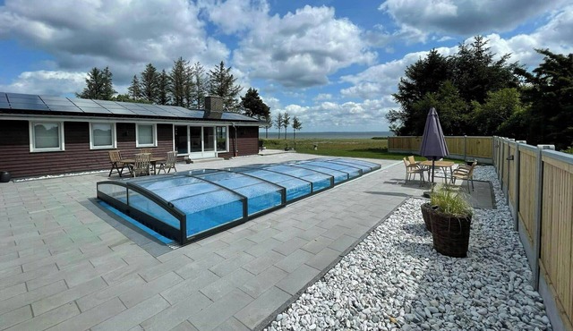 Holiday home with pool and fjord views on Lundø