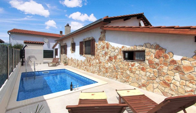 Holiday home with private terrace and pool