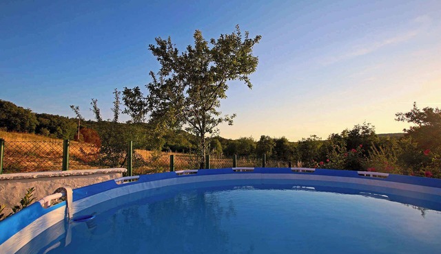 Holiday home with swimming pool and barbecue