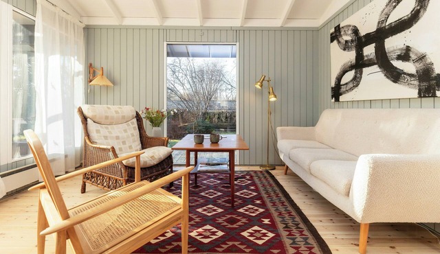 Holiday home with vintage finds and personal art