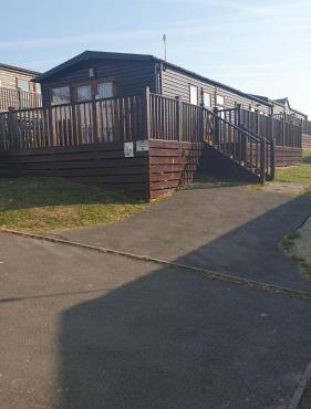 Holiday Lodge, sleeps 4, with sea & countryside views