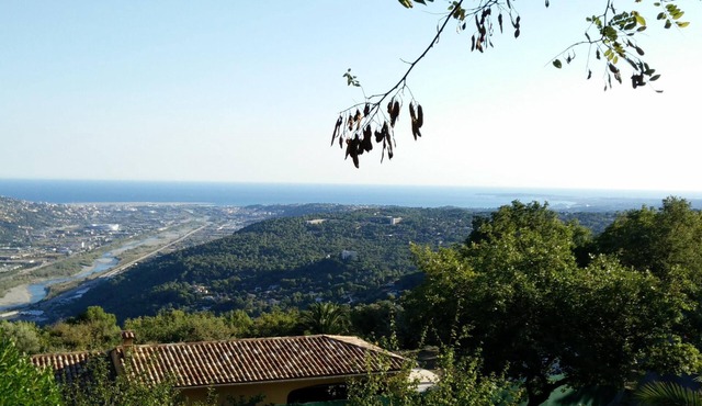 Holiday villa with communal pool, large terrace and magnificent sea views