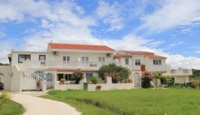 Holiday with the family at the sandy beach, apartments with sea view