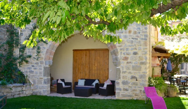 Holidays in Lagrasse. Stunning medieval apartment set in walled garden with pool
