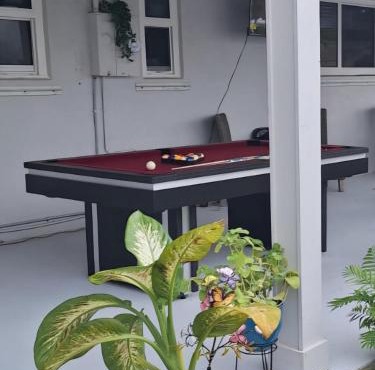 Holliday 3-bedroom Private duplex House full kitchen living room Parking WiFi BBQ Karaoke Available