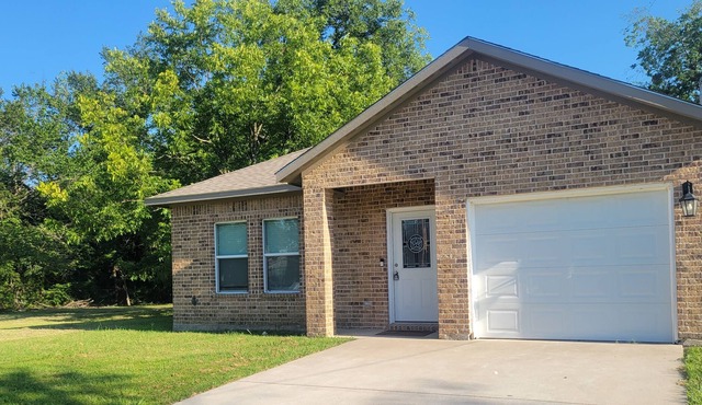 Home across the street from a park with pickle ball and basketball court.n