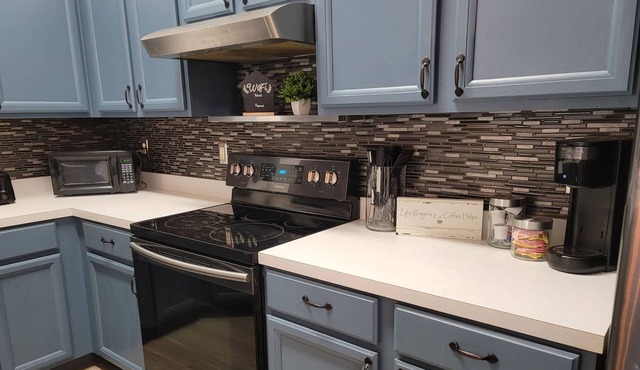 Home away from home!! Spacious 4 bedroom home!! With a fenced-in backyard!!!!!