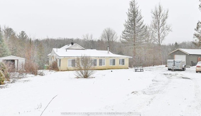 Home in quiet rural setting, near lakes.
