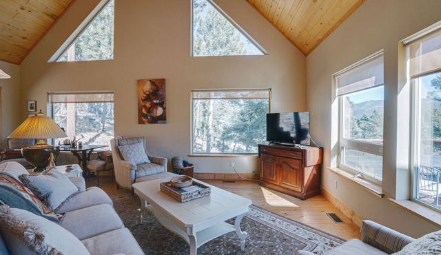 Home in the Woods with a Spacious Deck