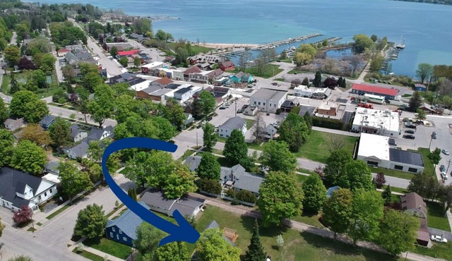 Home located 2 blocks to the beach and Suttons Bay Village