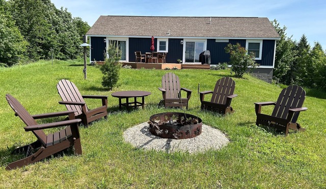 Home north of Suttons Bay. Game room, arcade games, Grill, Fire pit. Dog ok