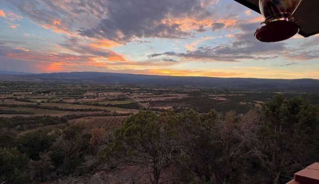 Home on the mesa’s edge the Proverbial Million Dollar View, jacuzzi and orchard