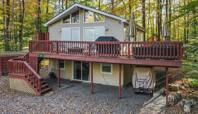 Home with a fireplace, gym, tennis, pool, beach access, game room & washer/dryer