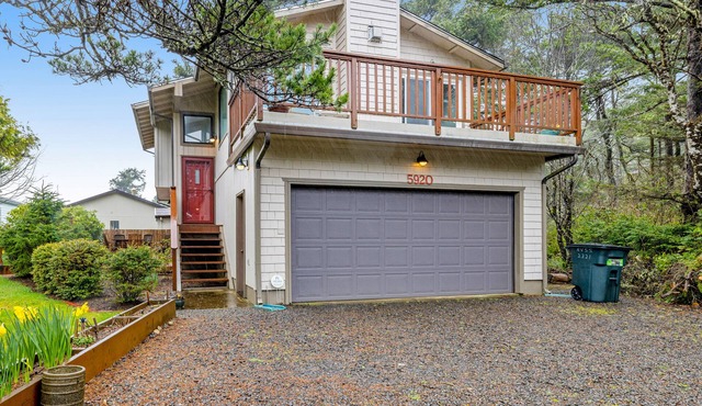 Home with gas fireplace, washer/dryer, & 2 outdoor spaces - walk to beach