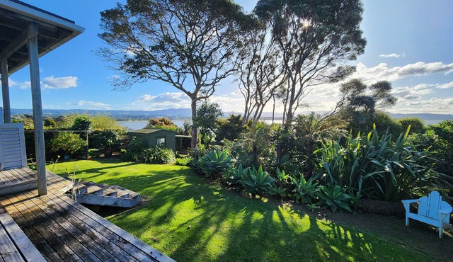 Home with gorgeous mountain and water views