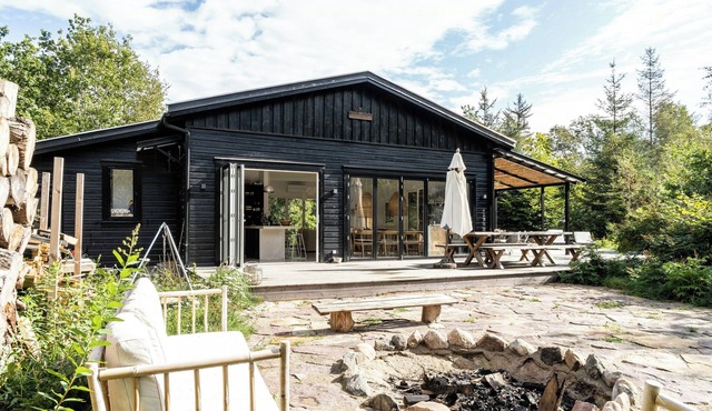 Home with panoramic windows and stones