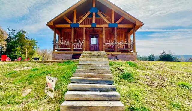 Homestead cabin on the hill with outdoor movie projector