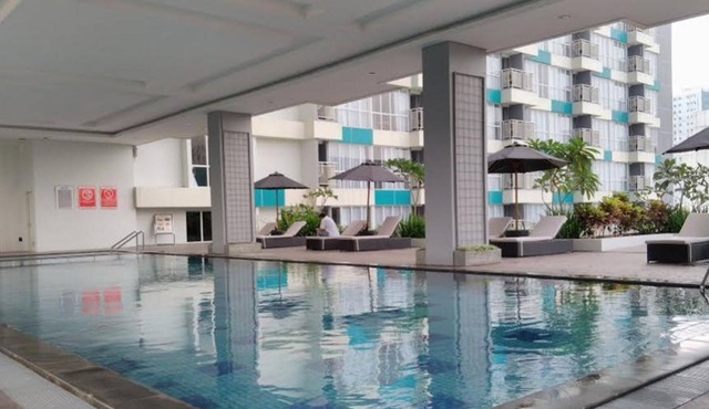 Homey and Good Studio at H Residence Apartment