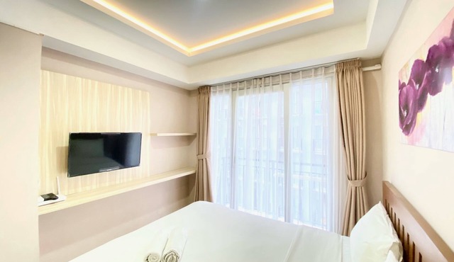 Homey Studio Room At Grand Asia Afrika Apartment