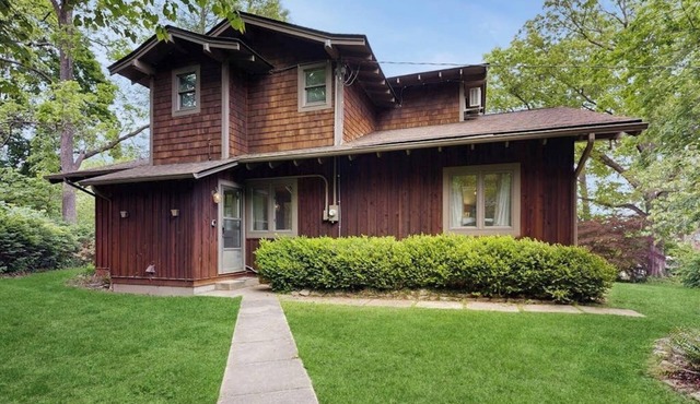 Homey two-story home with shared pool, WiFi, & full kitchen - dog-friendly