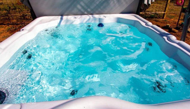 Hot Tub. 140 acres. Exotics to feed. River on site. Summer haven.
