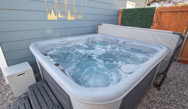 HOT TUB - Entire NEW Home - Walk to Light Rail - King Beds - Firepit Theatre
