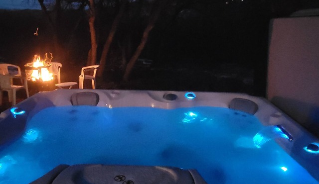 Hot tub fun, warm up by the fire pit, after a long day of all day play!