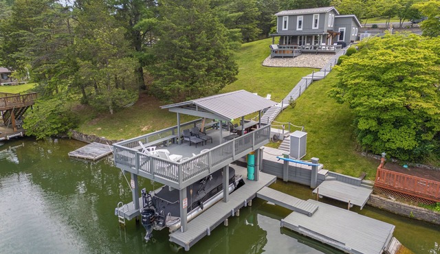 Hot tub, private dock, with water front lake access for relaxing or exploring.