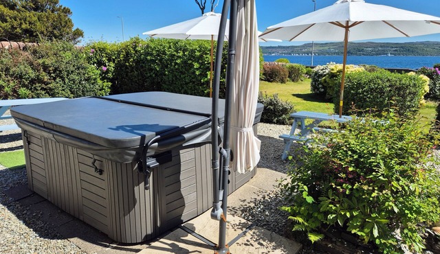 Hot tub. Water views. Sleeps 12. A perfect base to explore Argyll. Pet friendly.