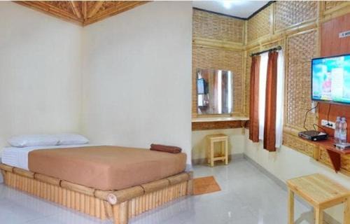 Hotel O Penginapan Putri Asih Sawarna