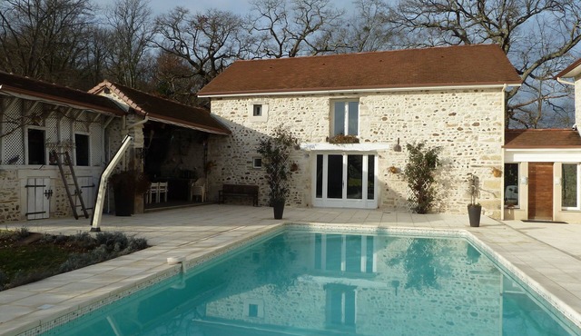HOUSE AT THE FOOT OF THE PYRENEES