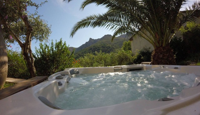 HOUSE BETWEEN SEA AND MOUNTAIN