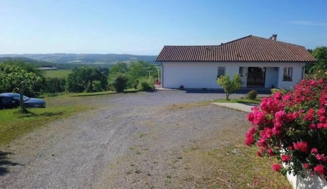 House between sea and mountains.