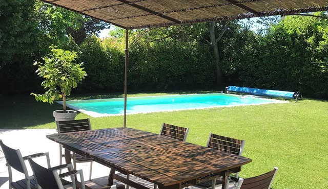 House by the river with swimming pool.