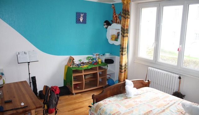 House by the water with enclosed garden