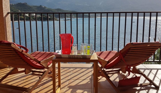 House feet in water, comfort and relaxation, sandy beach in front of house