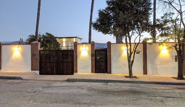 House in a residential zone, gated parking