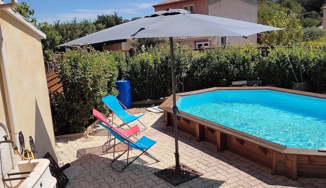 House in quiet subdivision, with swimming pool.