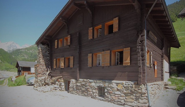 House in the middle of the Swiss Alps