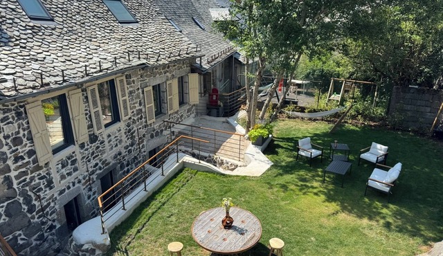 House in the shadow of the bell tower