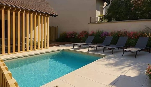 House in village center and swimming pool