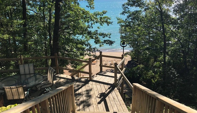 House is located on Lake Huron with a private beach