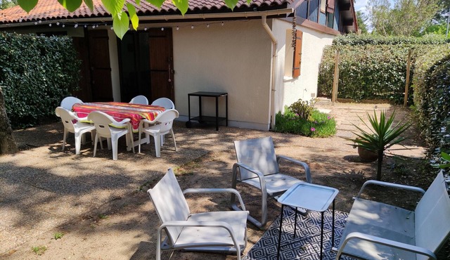 House near beach in residence with swimming pool