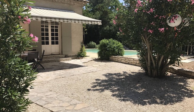 House near Tour Magne in park with swimming pool