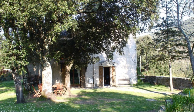 House of character in garden near sea and river