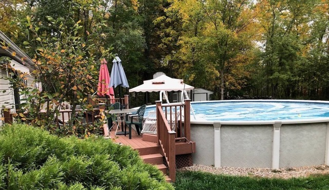 House on private lake with a pool
