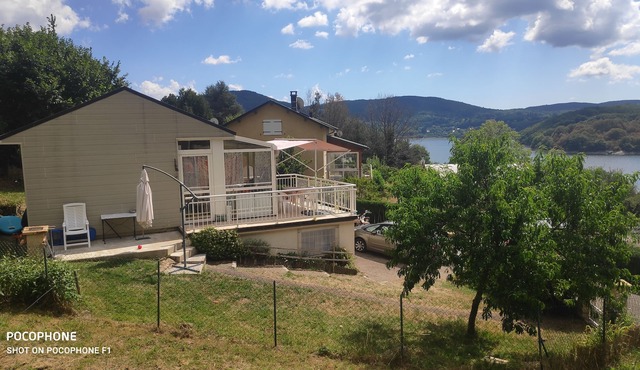 HOUSE ON THE EDGE OF LAOUZAS LAKE