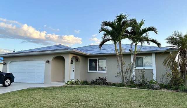 House over the golf course with heated pool!